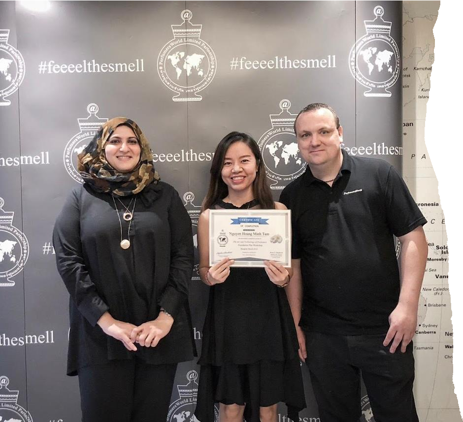Amira El Aasar with a certificate recipient and a PerfumersWorld trainer