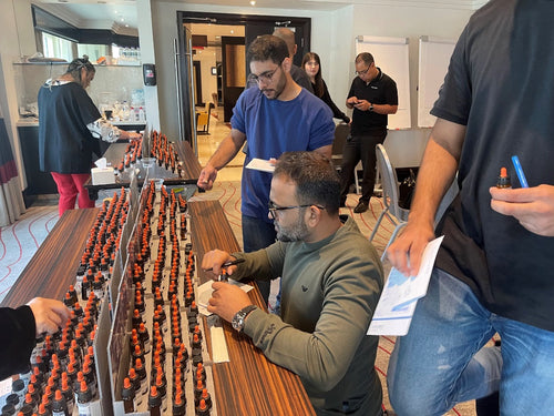 Participants working with fragrance materials at a PerfumersWorld workshop